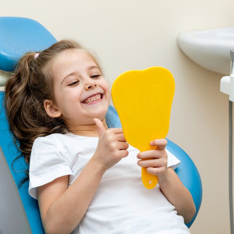 Little girl comfortable at dentist in Portland, Oregon